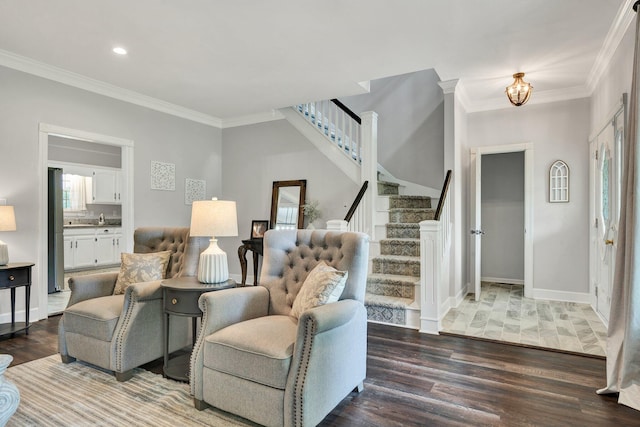living room with wood finished floors, recessed lighting, stairway, and crown molding