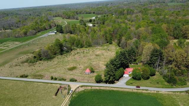 bird's eye view featuring a rural view and a view of trees