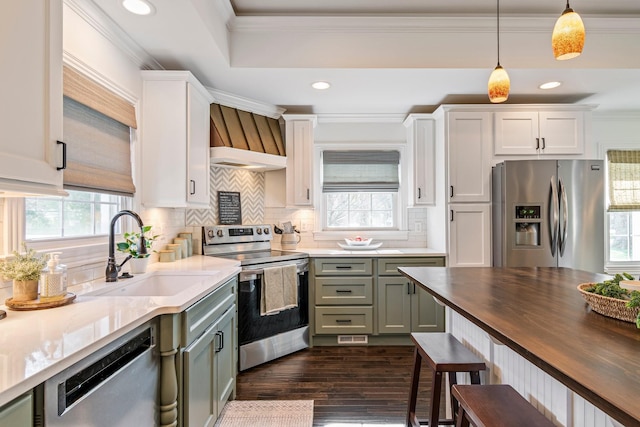 8803 Horton Hwy, College Grove, TN 37046 - kitchen with butcher block counters, a wealth of natural light, appliances with stainless steel finishes, and a sink