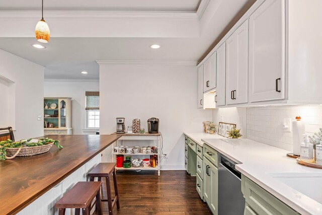 8803 Horton Hwy, College Grove, TN 37046 - kitchen with stainless steel dishwasher, tasteful backsplash, butcher block counters, ornamental molding, and dark wood-type flooring