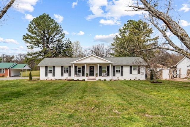 8803 Horton Hwy, College Grove, TN 37046 - neoclassical / greek revival house featuring a porch, a carport, and a front yard
