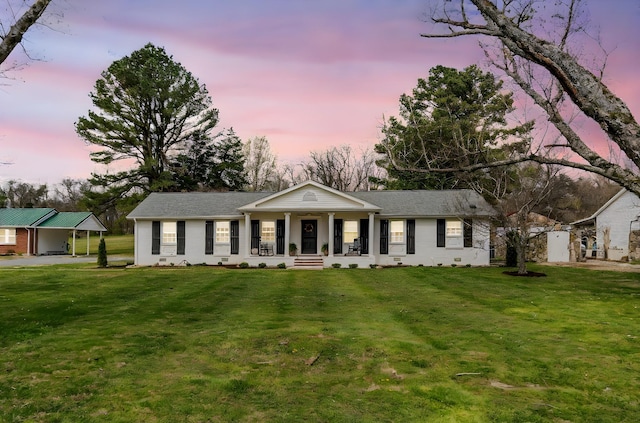 8803 Horton Hwy, College Grove, TN 37046 - view of front of property featuring a lawn, a carport, and covered porch