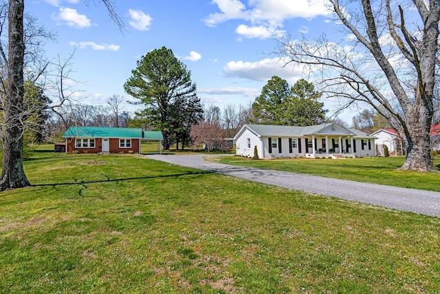 8803 Horton Hwy, College Grove, TN 37046 - exterior space featuring gravel driveway and a front yard