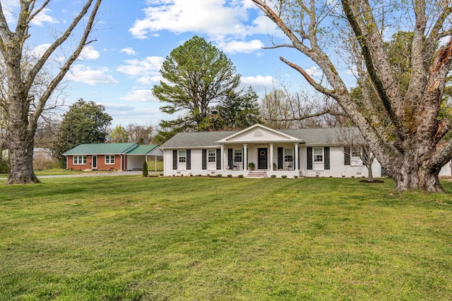 8803 Horton Hwy, College Grove, TN 37046 - view of front of property featuring a porch and a front lawn