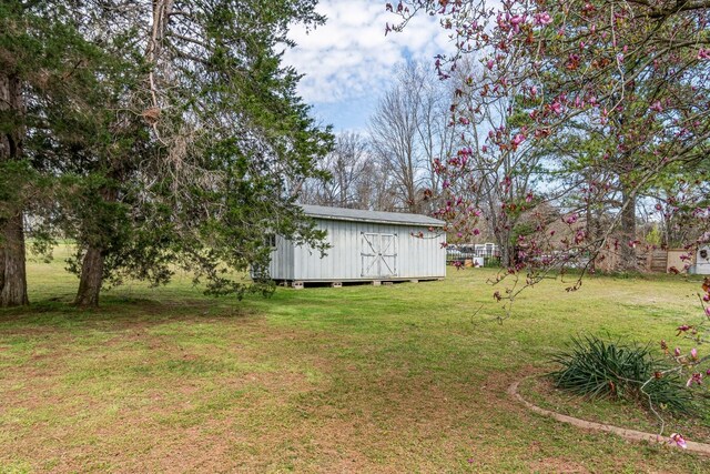 8803 Horton Hwy, College Grove, TN 37046 - view of yard with an outdoor structure