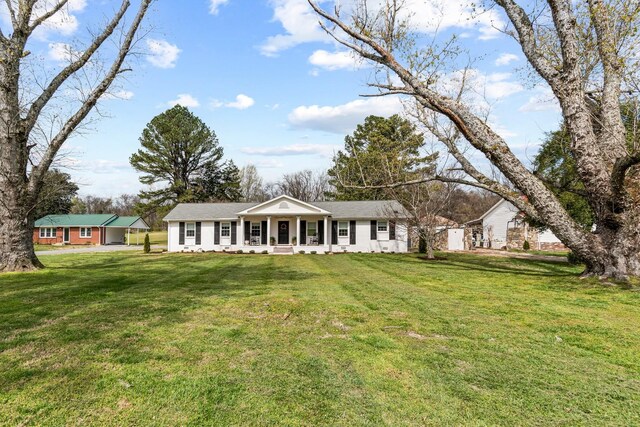 8803 Horton Hwy, College Grove, TN 37046 - greek revival inspired property with a porch and a front yard