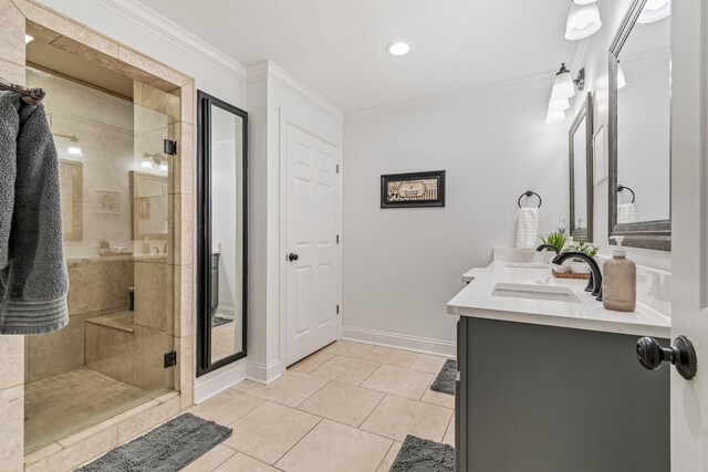 8803 Horton Hwy, College Grove, TN 37046 - bathroom featuring crown molding, a sink, double vanity, and a stall shower