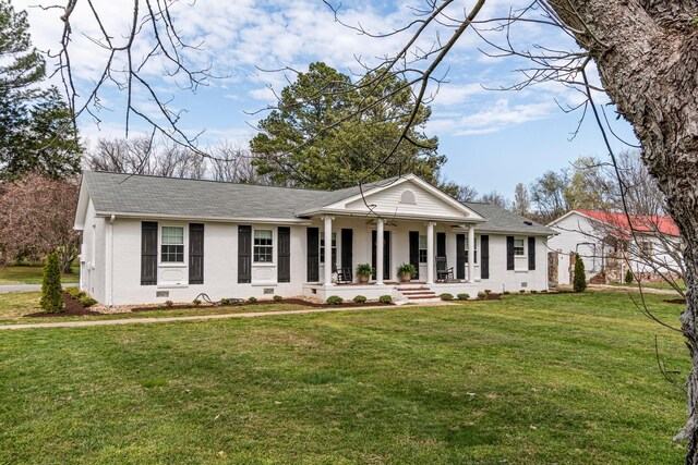 8803 Horton Hwy, College Grove, TN 37046 - neoclassical / greek revival house featuring a front lawn, crawl space, roof with shingles, and covered porch