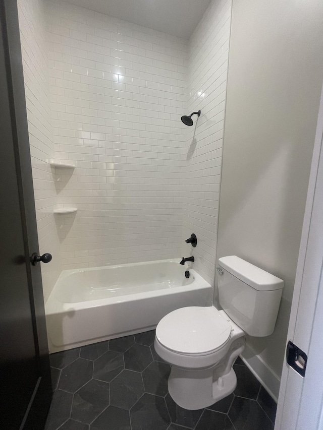1167 Rock Church Rd, Dickson, TN 37055 - bathroom featuring toilet, tile patterned floors, and tub / shower combination