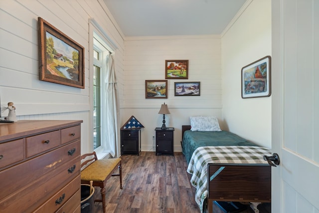 703 Gaither Hinson Rd, Waynesboro, TN 38485 - bedroom featuring wooden walls, ornamental molding, and dark wood-type flooring
