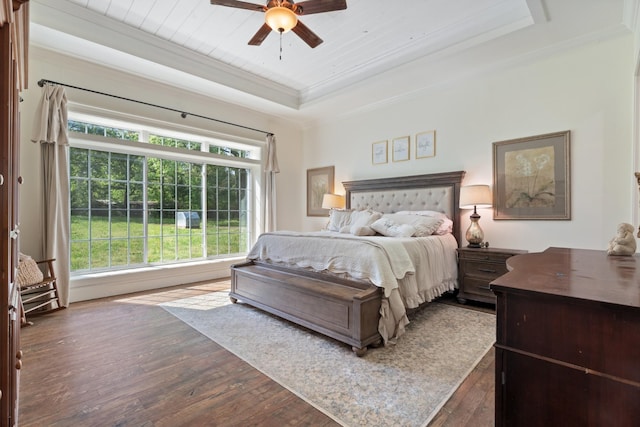 703 Gaither Hinson Rd, Waynesboro, TN 38485 - bedroom featuring a ceiling fan, dark wood-style flooring, wooden ceiling, ornamental molding, and a tray ceiling