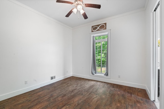 703 Gaither Hinson Rd, Waynesboro, TN 38485 - spare room featuring dark wood-style flooring, ceiling fan, baseboards, visible vents, and ornamental molding
