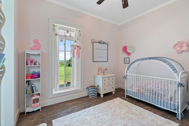 703 Gaither Hinson Rd, Waynesboro, TN 38485 - bedroom with ceiling fan, a nursery area, wood finished floors, baseboards, and ornamental molding