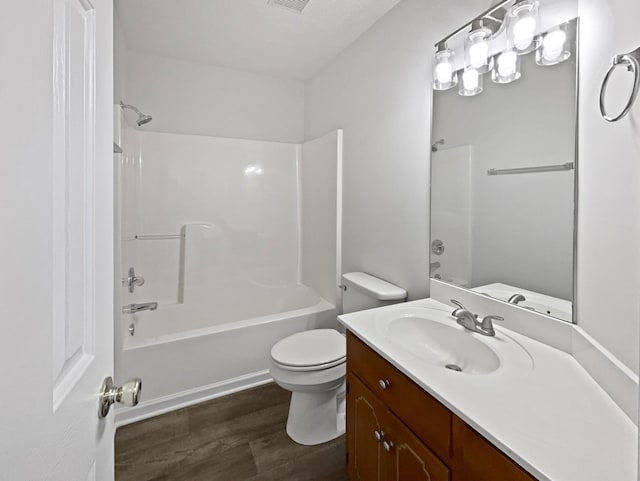 full bathroom with wood finished floors, visible vents, toilet, vanity, and tub / shower combination