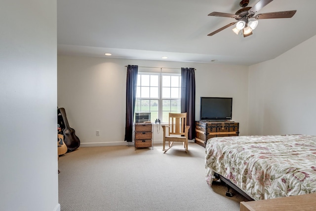 carpeted bedroom with a ceiling fan, baseboards, and recessed lighting