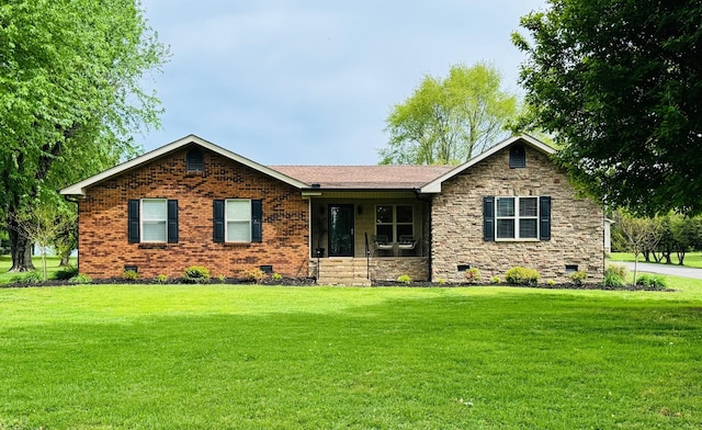 ranch-style house with stone siding, crawl space, and a front yard