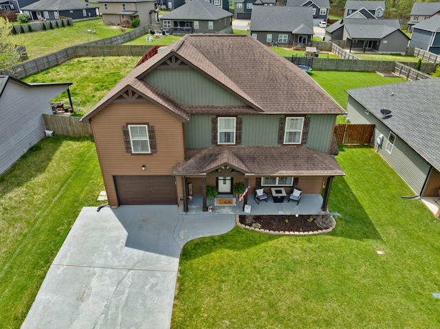 view of front of house featuring a garage, a shingled roof, a residential view, and concrete driveway