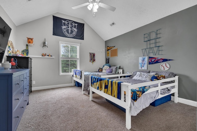 bedroom featuring vaulted ceiling, carpet flooring, baseboards, and a ceiling fan