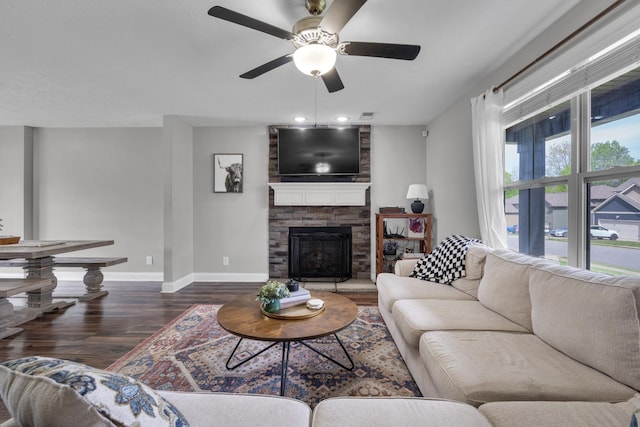 living room featuring recessed lighting, wood finished floors, baseboards, a fireplace, and ceiling fan