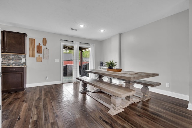 dining space featuring dark wood-style floors, baseboards, visible vents, and recessed lighting