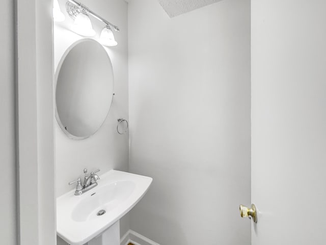 288 Donna Dr Unit F, Hendersonville, TN 37075 - bathroom with a sink and a textured ceiling