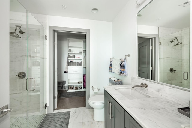 1616 W End Ave Unit 1803, Nashville, TN 37203 - full bathroom featuring toilet, visible vents, vanity, and a stall shower