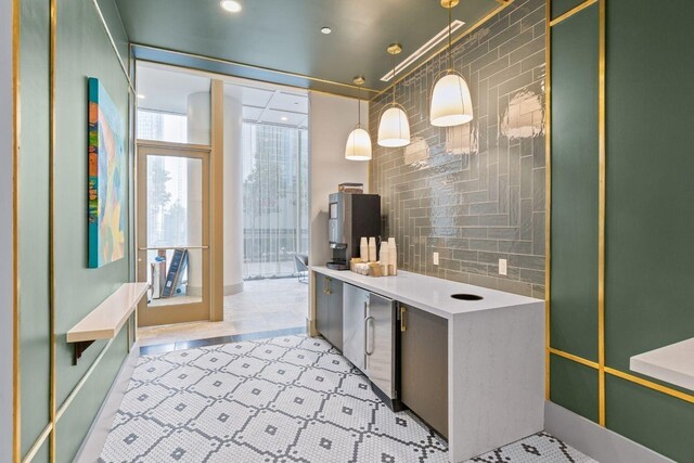 1616 W End Ave Unit 1803, Nashville, TN 37203 - bathroom featuring tasteful backsplash, tile patterned floors, and vanity