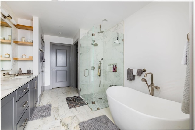 1616 W End Ave Unit 1803, Nashville, TN 37203 - bathroom featuring a freestanding bath, marble finish floor, vanity, and a marble finish shower