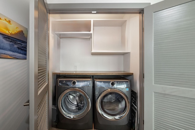 1616 W End Ave Unit 1803, Nashville, TN 37203 - clothes washing area with washing machine and dryer and laundry area