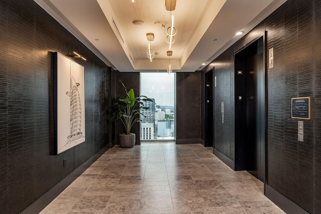 1616 W End Ave Unit 1803, Nashville, TN 37203 - hallway featuring a raised ceiling and floor to ceiling windows