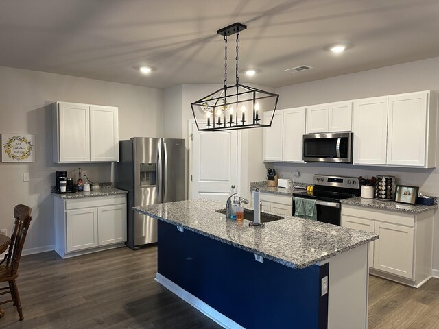 278 Addison Ave, Chapel Hill, TN 37034 - kitchen featuring stainless steel appliances, a sink, dark wood finished floors, pendant lighting, and light stone countertops