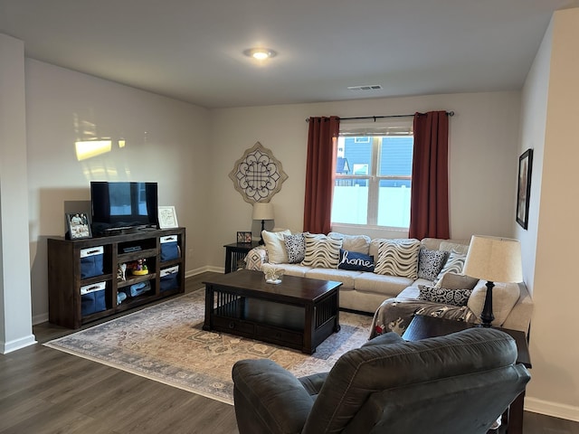 278 Addison Ave, Chapel Hill, TN 37034 - living room featuring visible vents, baseboards, and dark wood-type flooring