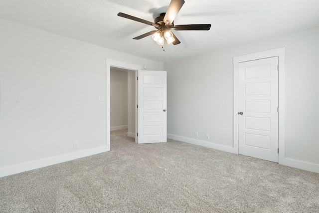 978 Alton Dr, Clarksville, TN 37043 - unfurnished bedroom with baseboards, a ceiling fan, and carpet flooring