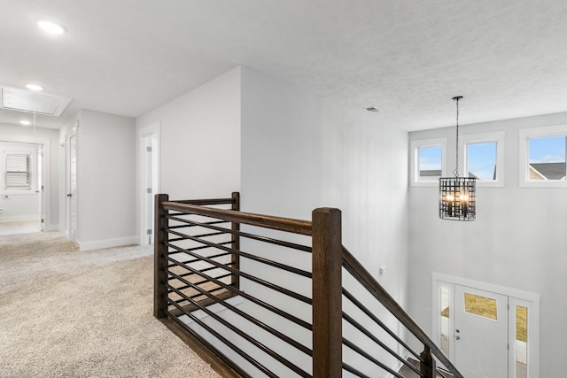 978 Alton Dr, Clarksville, TN 37043 - hall featuring an upstairs landing, attic access, carpet floors, baseboards, and recessed lighting