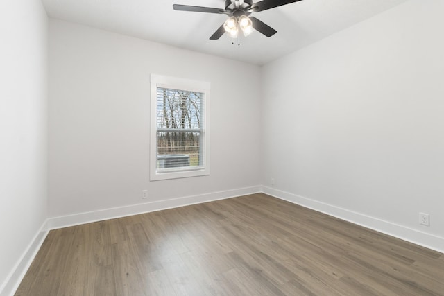 978 Alton Dr, Clarksville, TN 37043 - unfurnished room with baseboards, wood finished floors, and ceiling fan