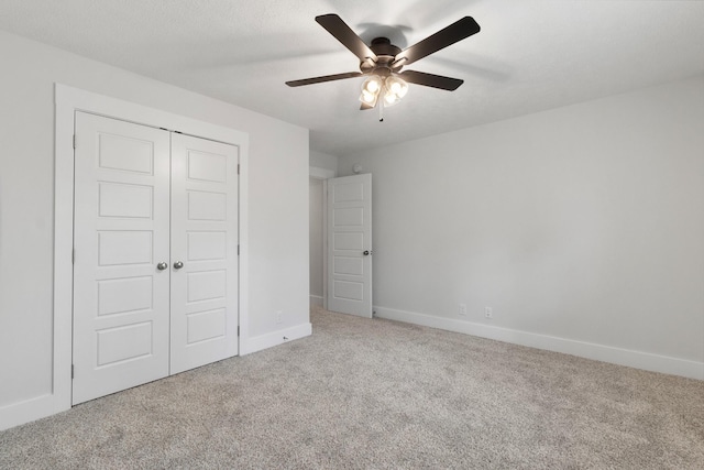 978 Alton Dr, Clarksville, TN 37043 - unfurnished bedroom with baseboards, a ceiling fan, carpet flooring, and a closet