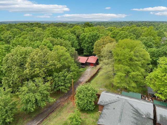 bird's eye view featuring a forest view
