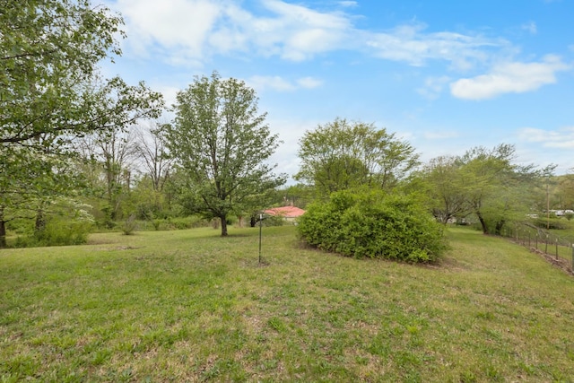 view of yard featuring fence
