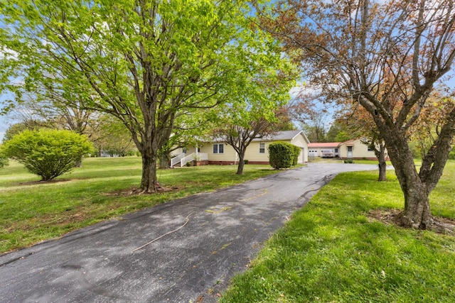 view of front of property with a front yard