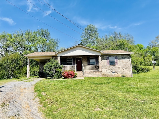 view of front facade featuring crawl space, a front lawn, driveway, a porch, and brick siding