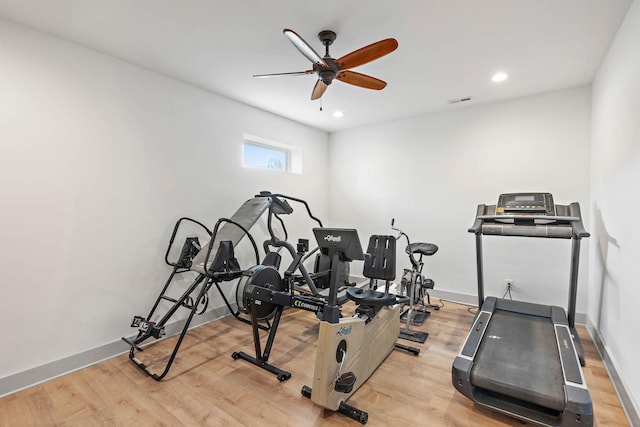 workout area featuring a ceiling fan, visible vents, wood finished floors, and recessed lighting