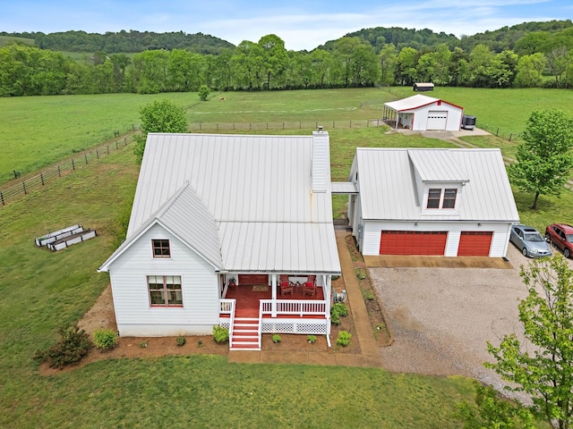 bird's eye view with a rural view and a forest view