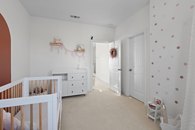 131 Benjamin Ln, Hendersonville, TN 37075 - bedroom with light carpet, a crib, and visible vents