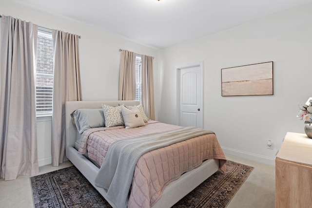 131 Benjamin Ln, Hendersonville, TN 37075 - bedroom featuring light carpet, baseboards, and multiple windows