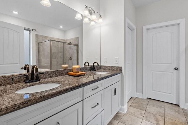 131 Benjamin Ln, Hendersonville, TN 37075 - full bathroom featuring tile patterned flooring, a sink, a shower stall, and double vanity
