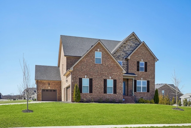 traditional home featuring driveway, a shingled roof, a front lawn, and brick siding