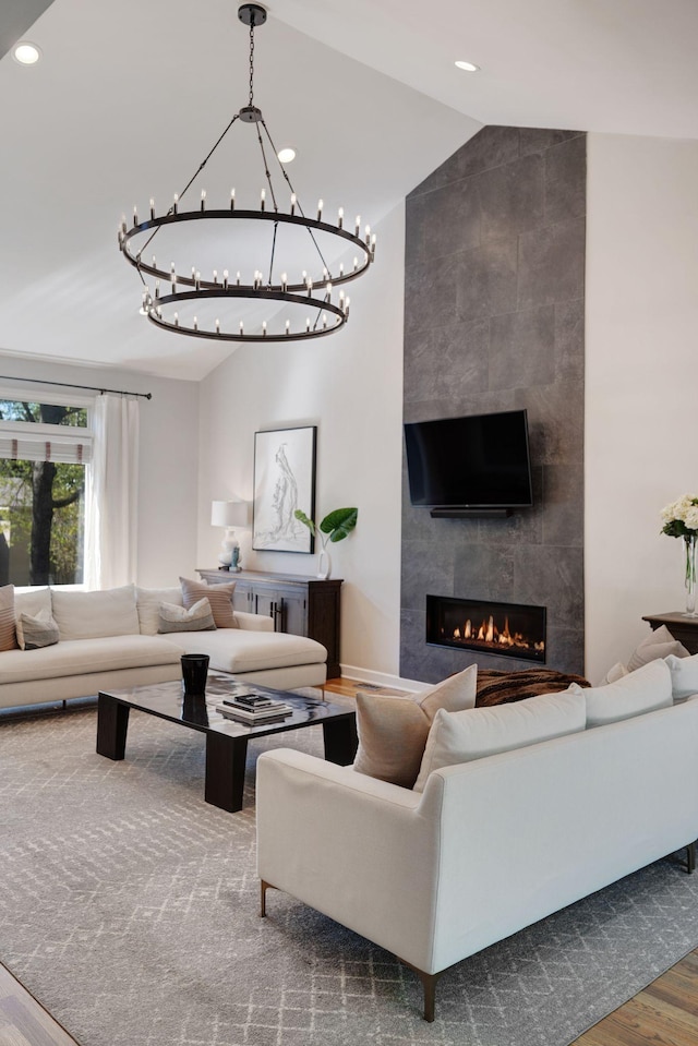 516 Harpeth Trace Dr, Nashville, TN 37221 - living area featuring a tile fireplace, a chandelier, wood finished floors, and recessed lighting