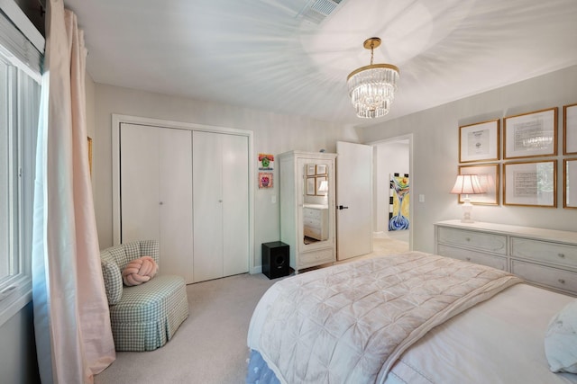 516 Harpeth Trace Dr, Nashville, TN 37221 - carpeted bedroom with a closet, an inviting chandelier, and visible vents