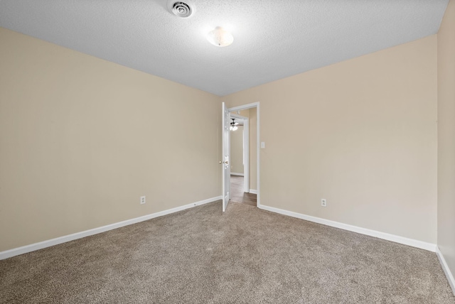 2041 Dotsonville Rd, Clarksville, TN 37042 - carpeted spare room with visible vents, baseboards, and a textured ceiling