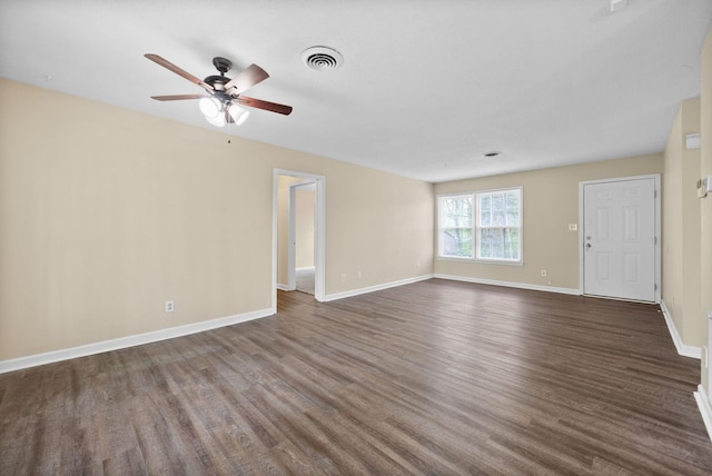 2041 Dotsonville Rd, Clarksville, TN 37042 - unfurnished living room with a ceiling fan, baseboards, dark wood-style flooring, and visible vents